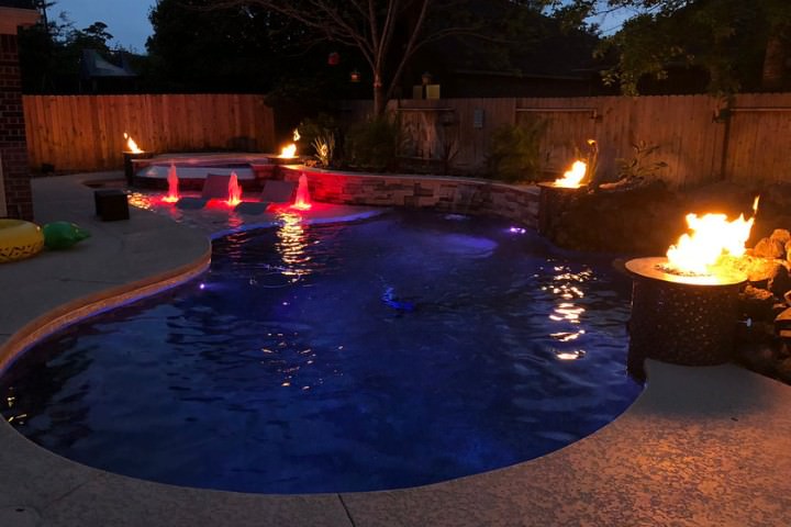 Fire and water features in a custom-designed pool in Houston Texas
